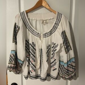 white embroidered peasant top
